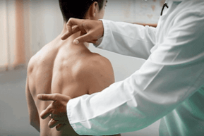 Examination of the back for pain under the left shoulder blade